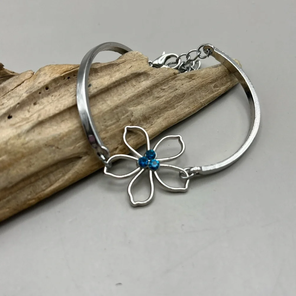 Silver Flower Bracelet with Blue Accents